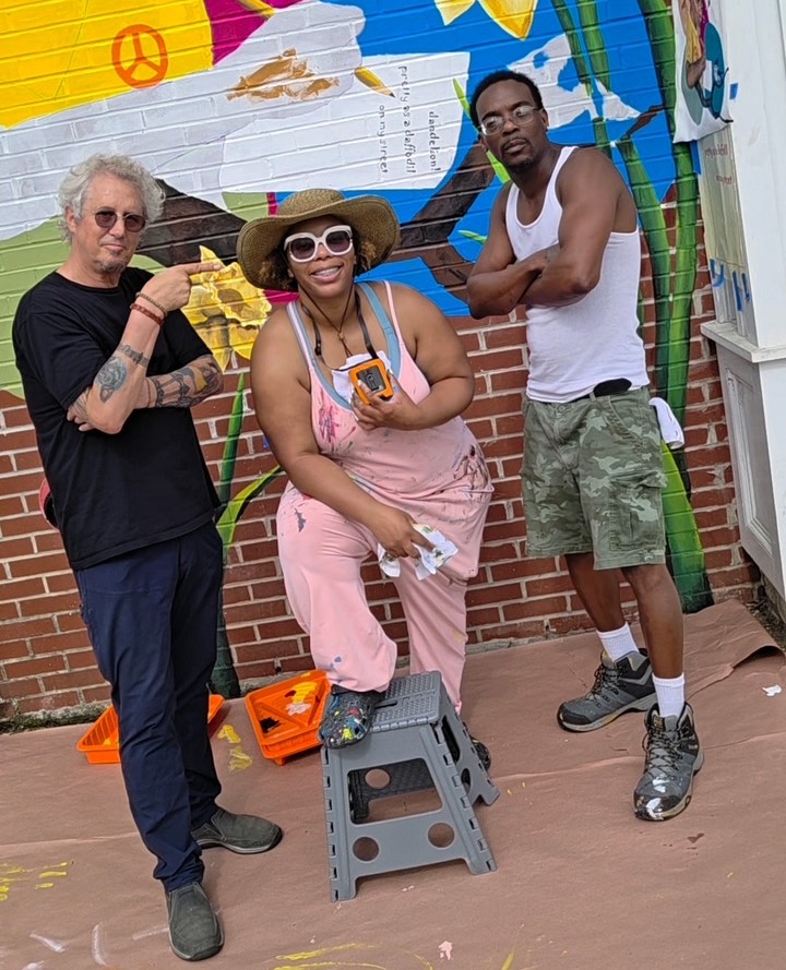 Artists behind the mural by Camden FireWorks